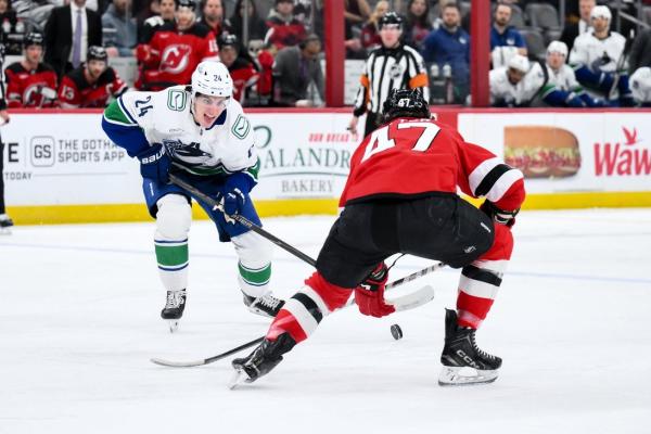 Zeev Buium authors two-point debut, Canucks edge Devils