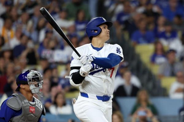 Dodgers hit four first-inning homers, outslug Cubs