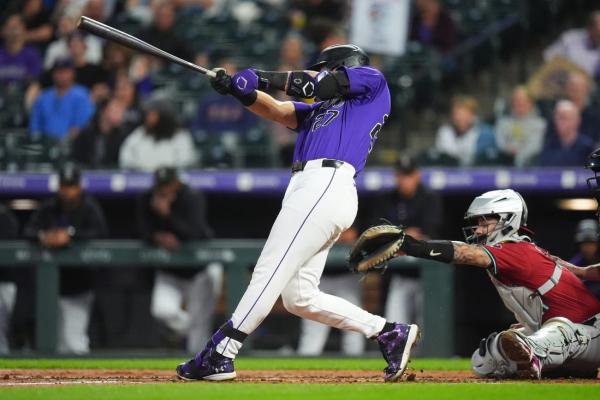 Rockies drop D-backs into tie for second NL wild card