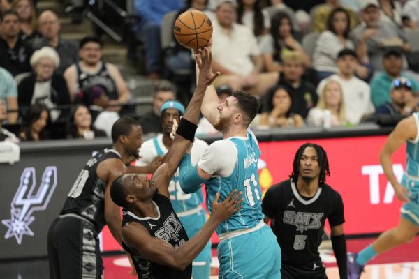 Hornets have little trouble in defeating hard-luck Spurs