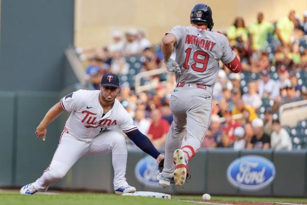 Twins wait out storm, grab walk-off win over Red Sox