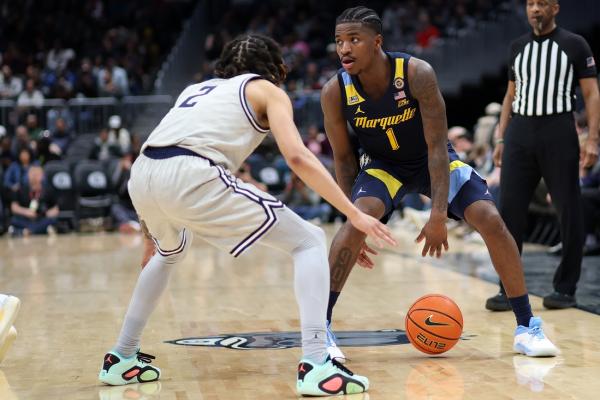 No. 21 Marquette notches road win in overwhelming Georgetown