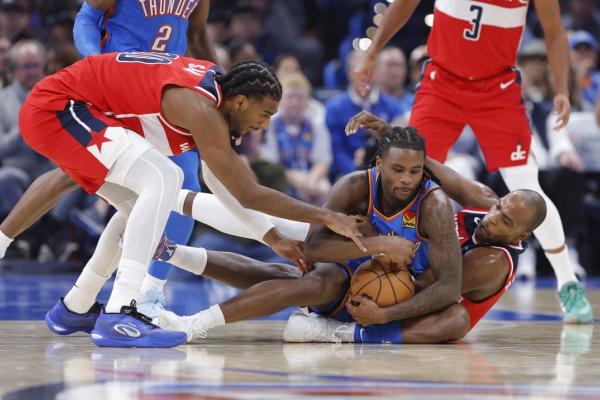 Thunder stay perfect by pulling away from Wizards late