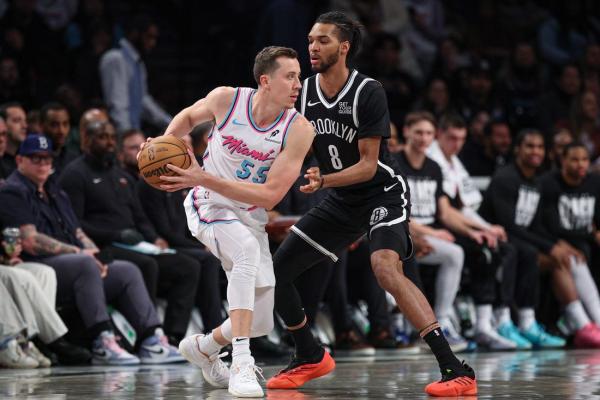 Nets outscore Heat 31-9 in fourth for comeback win