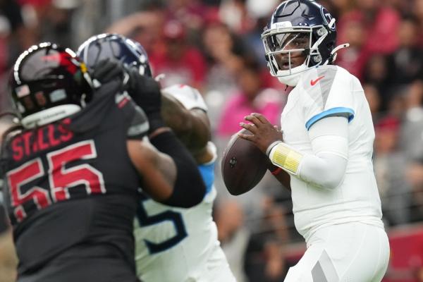 Titans pull off remarkable late rally to beat Cardinals for first win