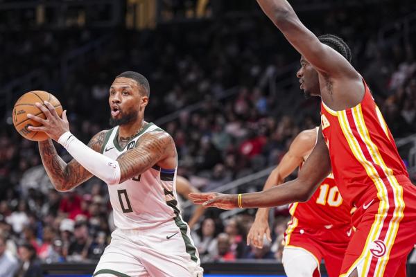 Giannis Antetokounmpo’s triple-double powers Bucks past Hawks