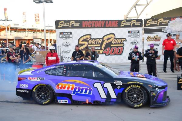 Denny Hamlin surges late to win South Point 400, ties Kevin Harvick with 60th Cup win