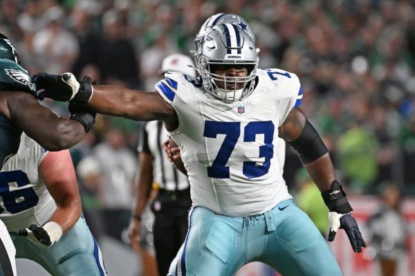 Cowboys' Tyler Smith signs $96M extension, best ever for a guard