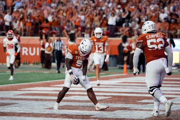 Arch Manning shines as No. 8 Texas rolls past Sam Houston