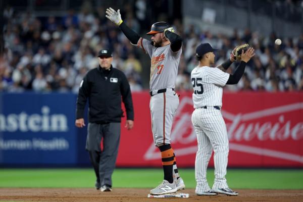 Orioles bang out 17 hits, down Yankees again