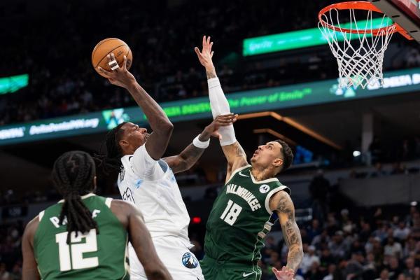 Missing two stars, Bucks edge Wolves on late FTs