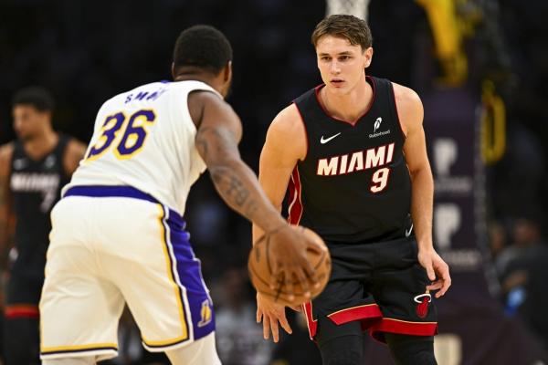 Luka Doncic posts triple-double to carry Lakers past Heat