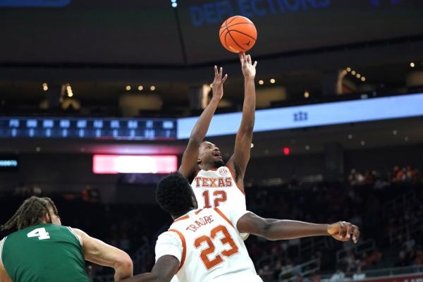 Tramon Mark (18 points) leads balanced Texas attack in romp over Le Moyne