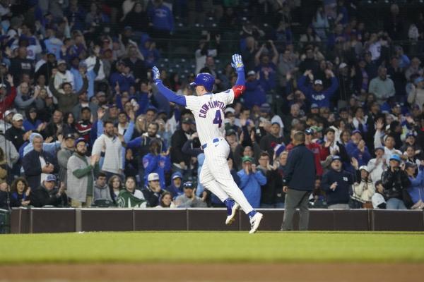 Cubs edge lowly Rockies to complete series sweep