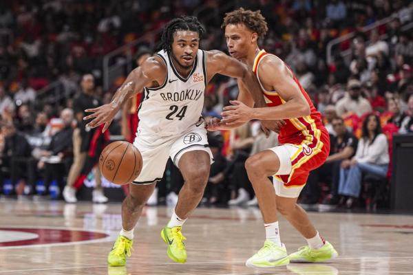 Trae Young’s 30 points help Hawks hold off Nets