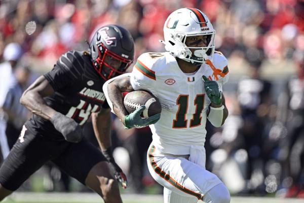 No. 6 Miami outlasts Louisville 52-45, improves to 7-0