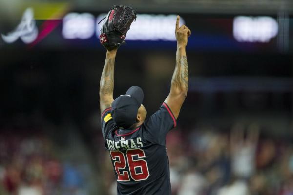 Braves top Reds in extras after teams score 16 runs in 8th