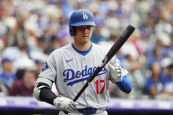 Dodgers outslug Rockies 9-7 to open series