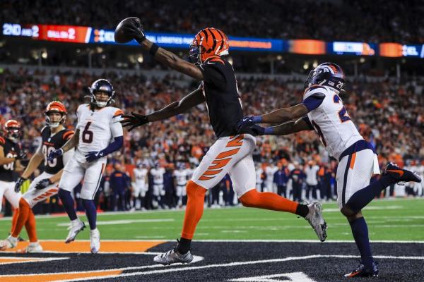 Bengals keep playoff hopes alive, survive in OT vs. Broncos