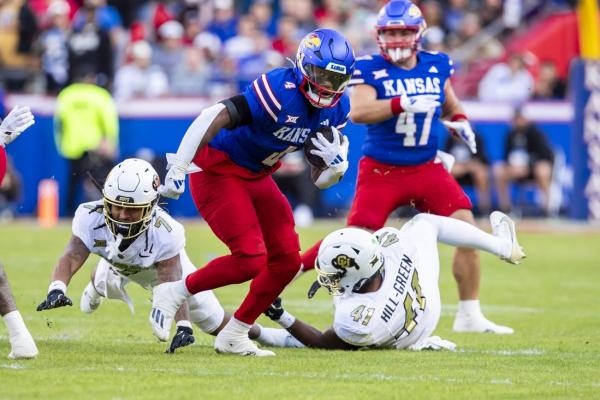 Devin Neal (4 TDs), Kansas set mark with upset of No. 16 Colorado