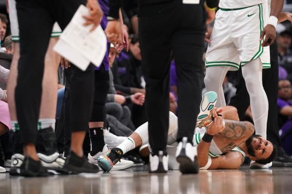 Celtics star Jayson Tatum exits with sprained left ankle