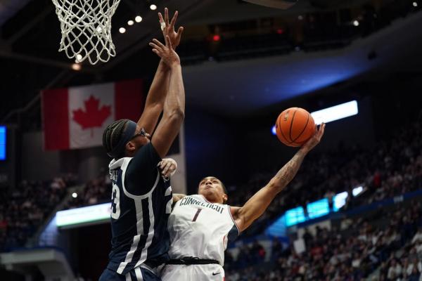 No. 19 UConn escapes pesky Butler in overtime