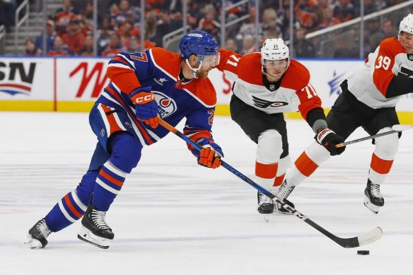 Oilers land first win, slide by Flyers in OT