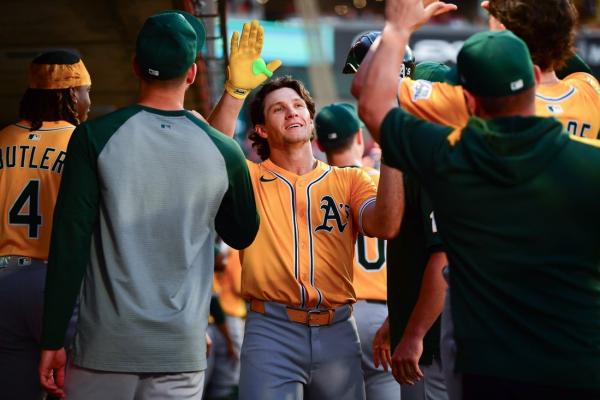 Athletics bash 4 HRs, 21 hits in blowout of Angels
