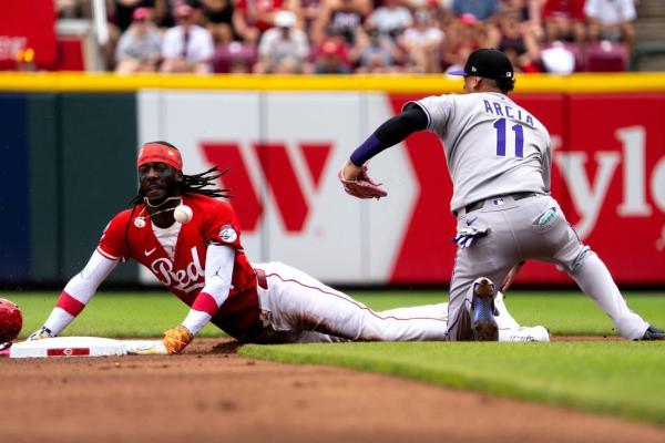 Reds rally for two in ninth to slay Rockies