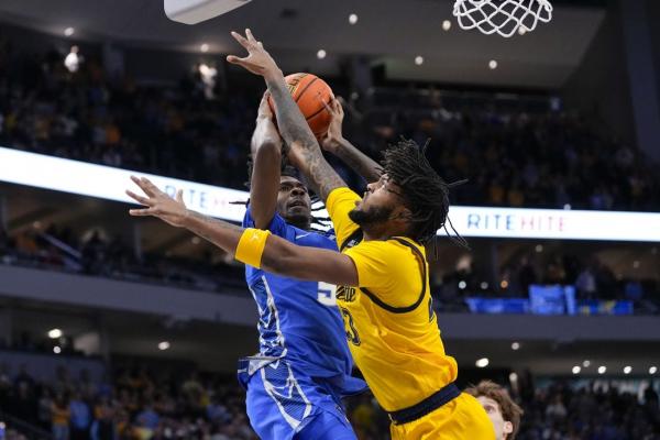 Kam Jones, No. 8 Marquette hold off Creighton