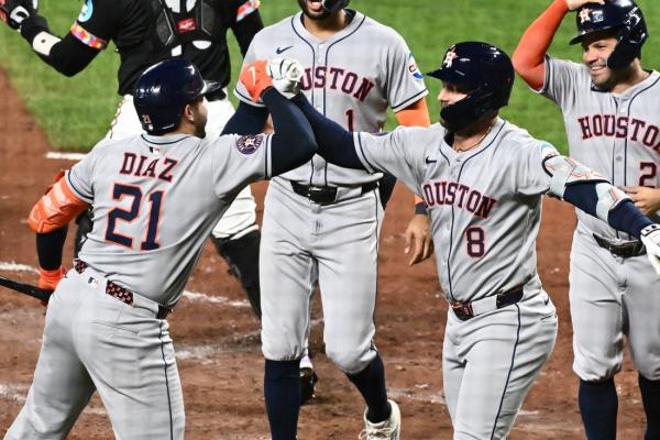 Christian Walkerâs late homer powers Astros past Orioles in slugfest
