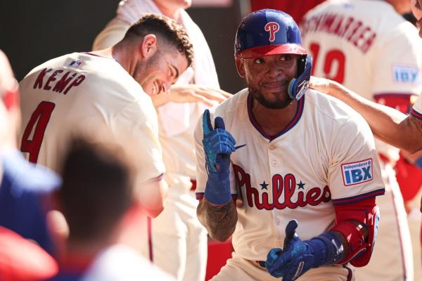 Strong pitching, three HRs carry Phillies past Reds