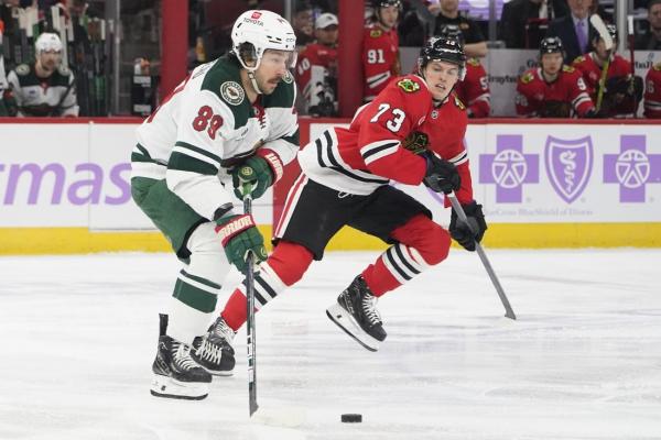 Wild build big lead, extend mastery of Blackhawks