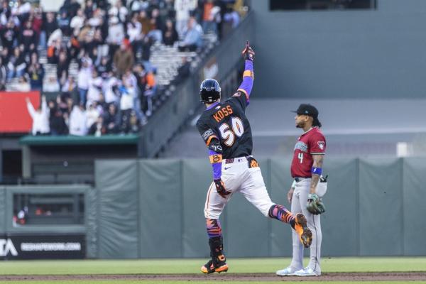 Giants use rookie’s slam, more homers to blast past Diamondbacks