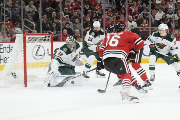 Wild get sixth straight, storm back to down Blackhawks