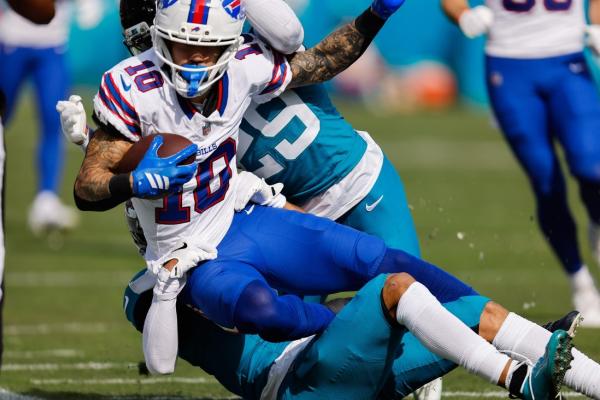 Bills overcome Jaguars 27-24 to end road playoff woes