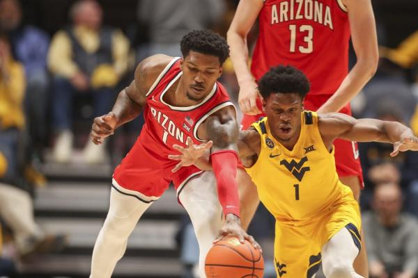 KJ Lewis leads Arizona in rout of No. 21 West Virginia