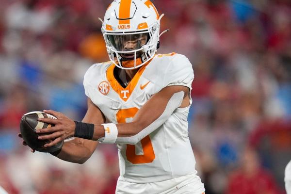 No. 7 Tennessee hesitant to pull reins on freshman QB