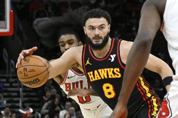 Hawks officially bring in F/C Kristaps Porzingis, waive F David Roddy