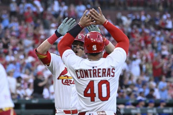 Cards club 4 homers, pummel first-place Cubs
