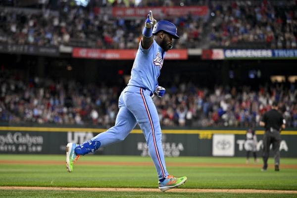 Adolis Garcia, Rangers beat Twins in 10 to avert 4-game sweep