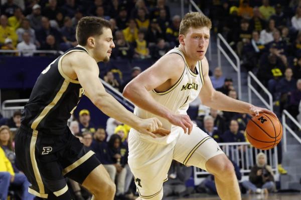 No. 20 Michigan edges No. 7 Purdue in battle for first place