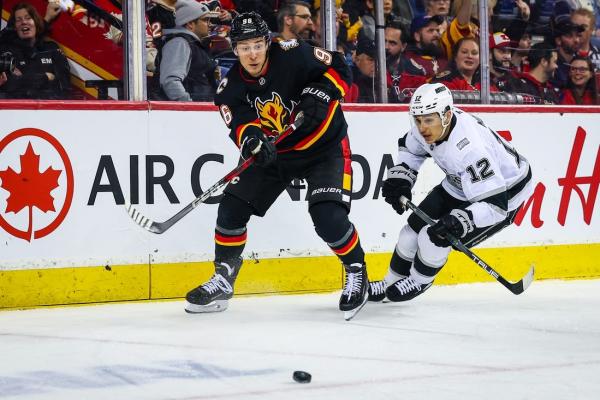 Flames rally to end Kings’ winning streak