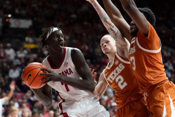 Texas hangs on to notch road upset of No. 13 Alabama