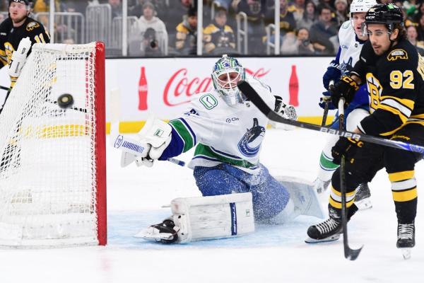 Canucks outlast Bruins in marathon shootout for victory