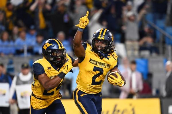 West Virginia DB Aubrey Burks taken from field on stretcher