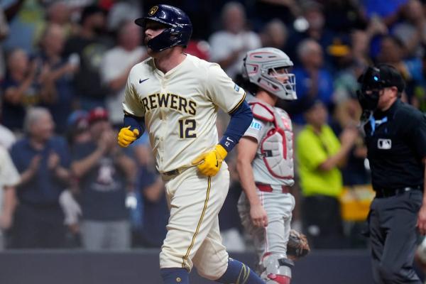 Crowned NL Central champs earlier in day, Brewers nip Phillies