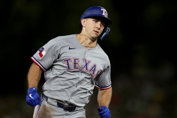Rangers pound Athletics for fourth straight victory