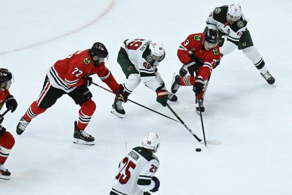 Blackhawks win in OT to end winless drought vs. Wild