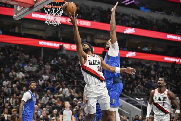 Closing 18-2 burst vaults Mavericks over Trail Blazers